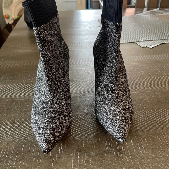 Black and silver, never worn. Fits like a sock. - Picture 3 of 4